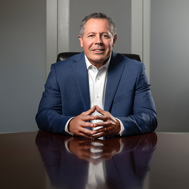 Dr. Johns sitting at a table