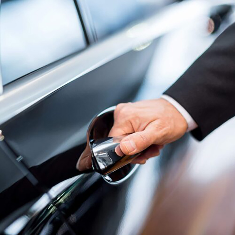 Man opening a car door
